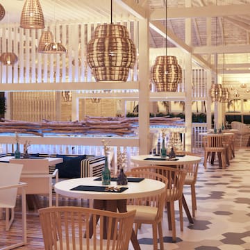 a room with tables and chairs