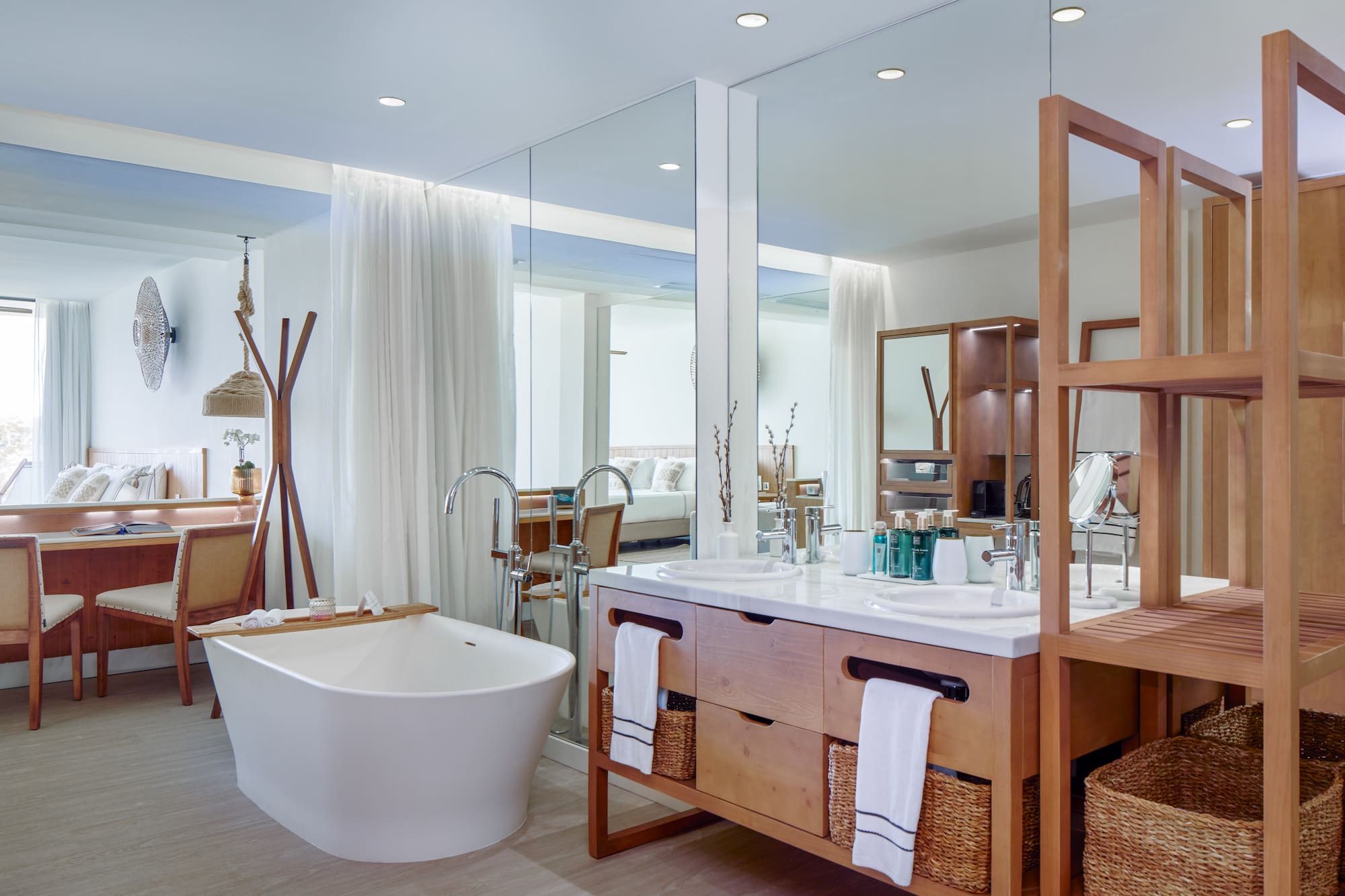a bathroom with a tub and a bathtub