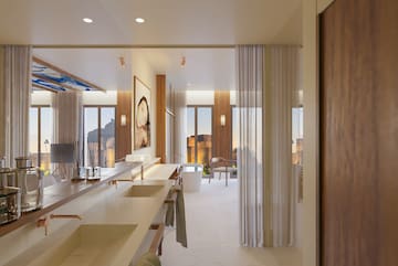 a bathroom with a large sink and tub