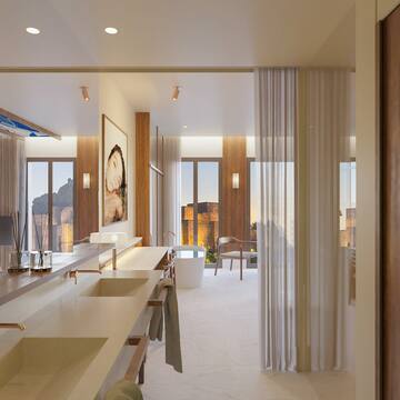 a bathroom with a large sink and tub