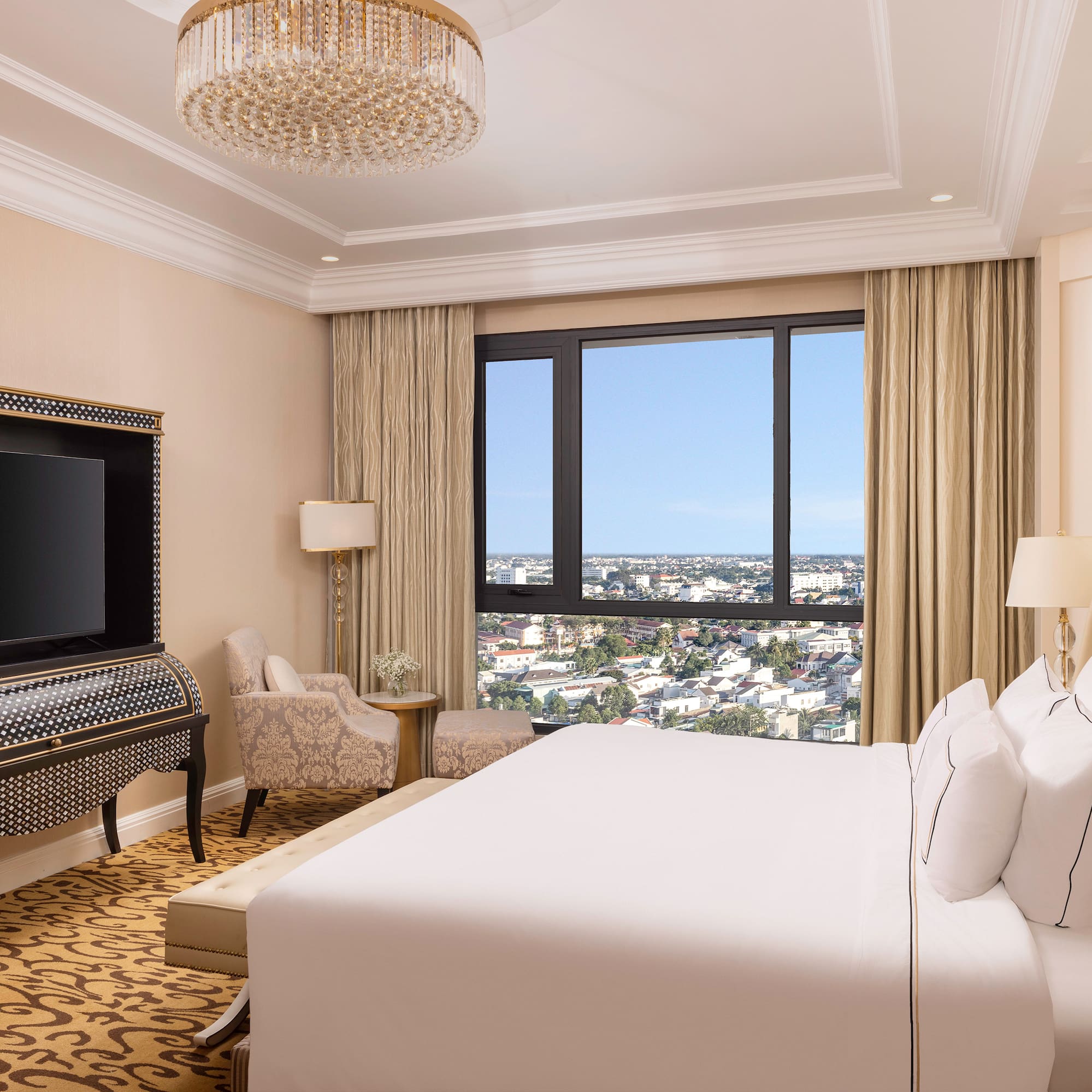 a room with a large bed and a piano