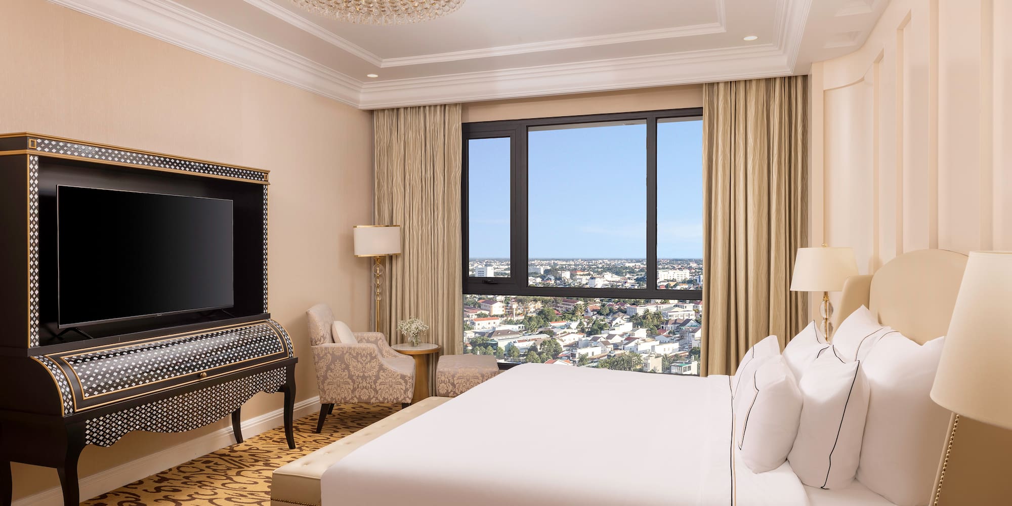 a room with a large bed and a piano