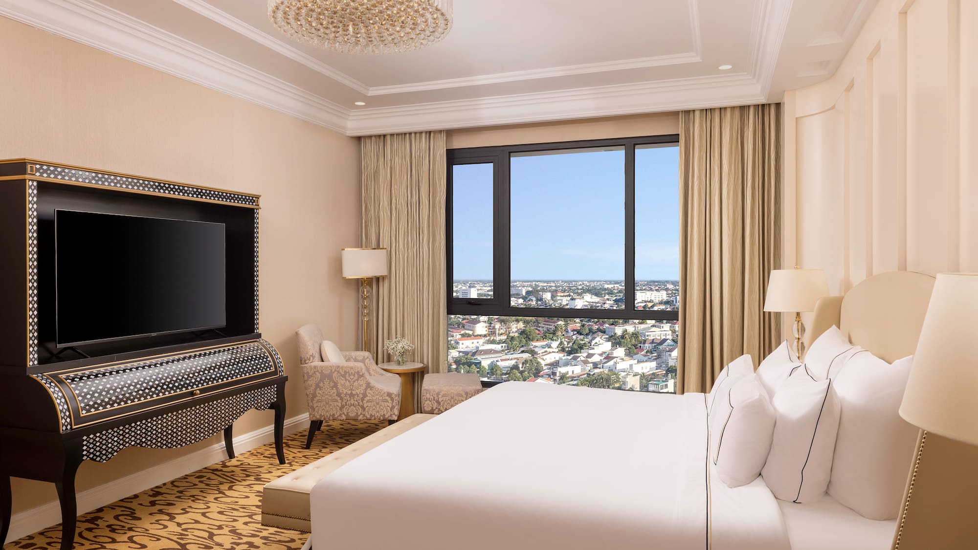 a room with a large bed and a piano