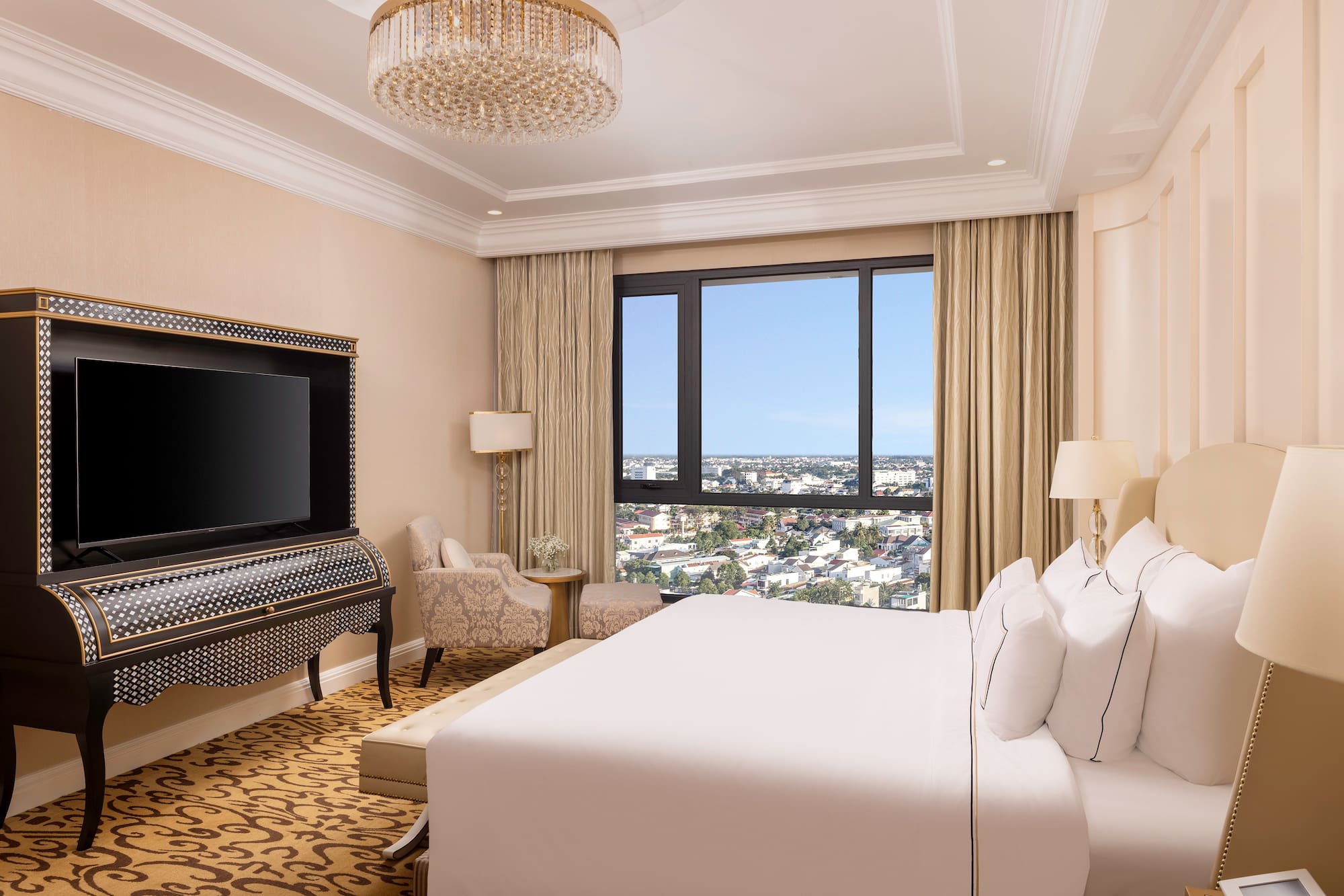 a room with a large bed and a piano