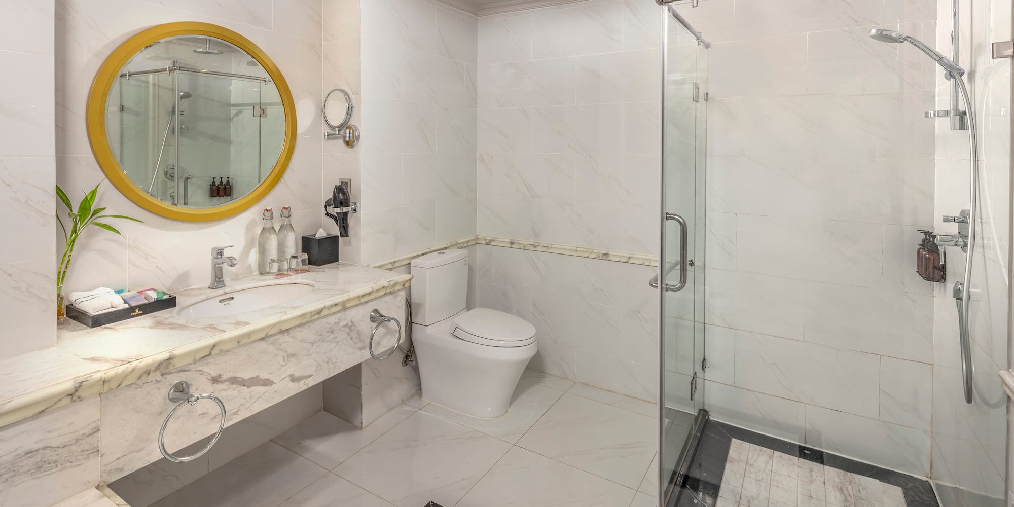 a bathroom with a shower and sink