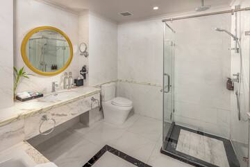 a bathroom with a shower and sink