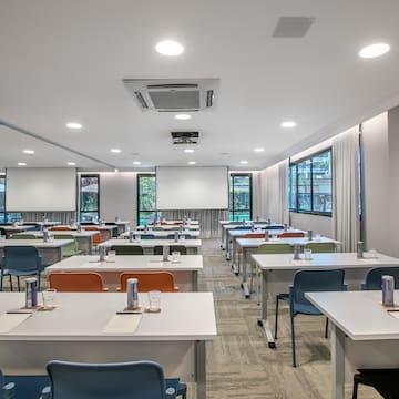 a room with tables and chairs