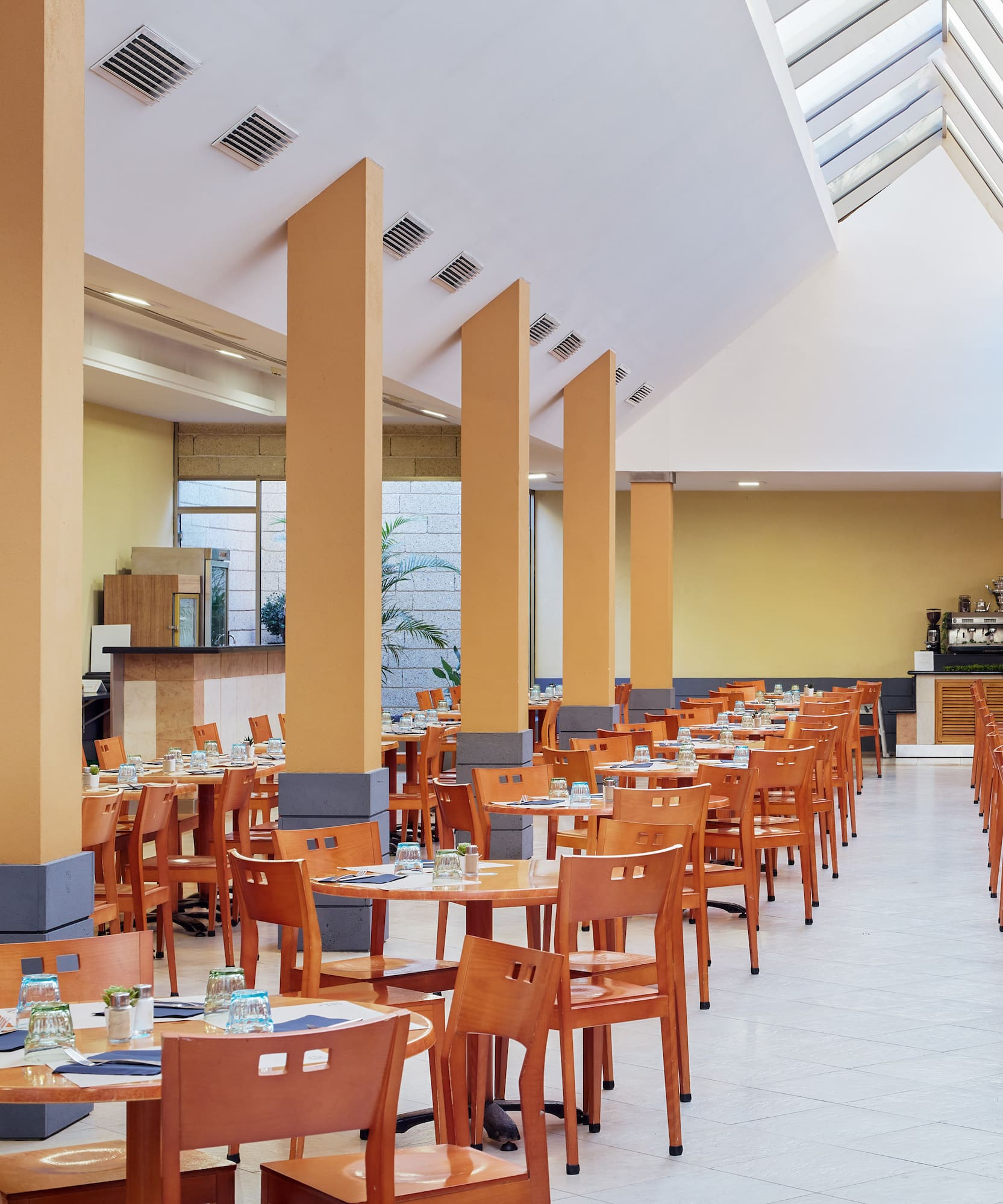 a room with tables and chairs