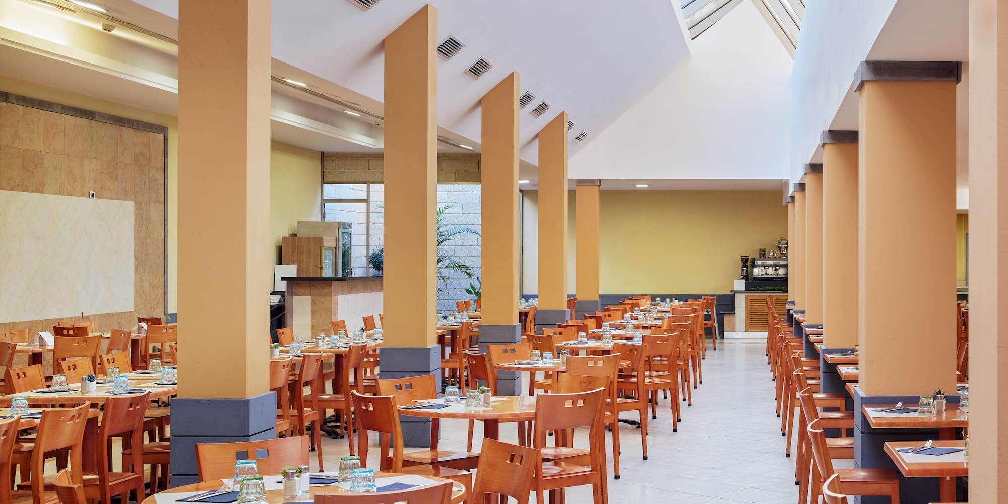 a room with tables and chairs