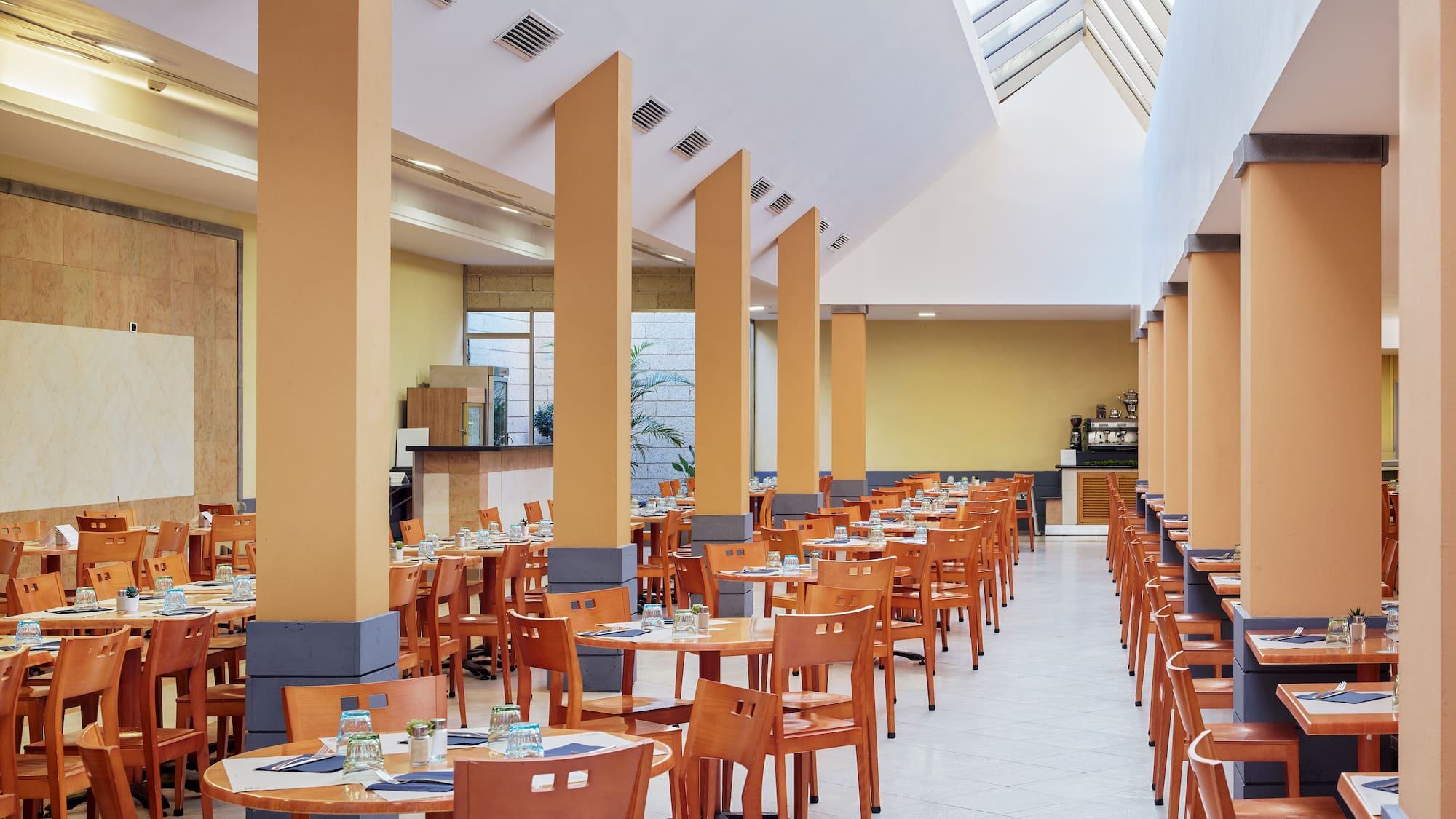 a room with tables and chairs