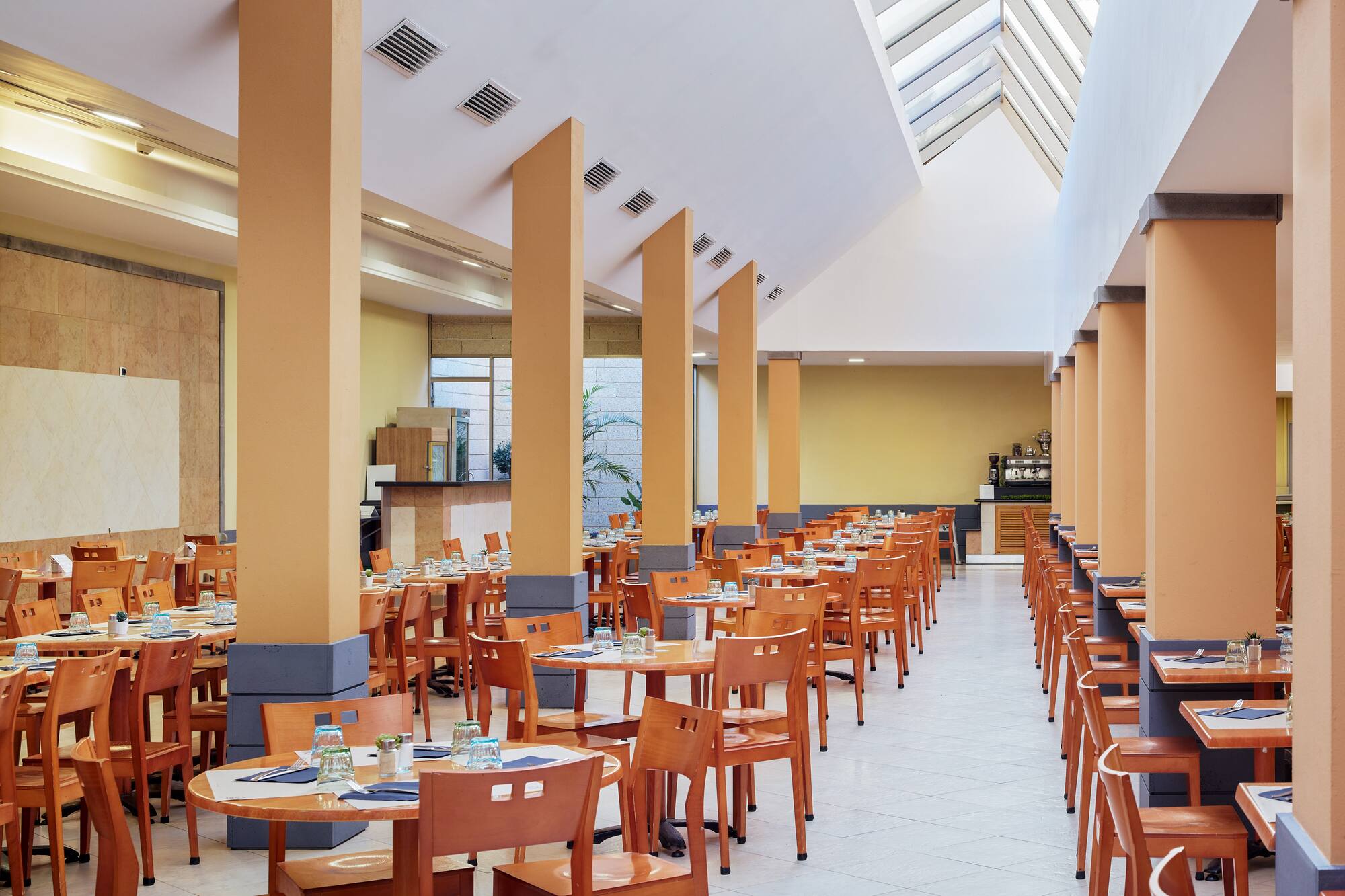 a room with tables and chairs