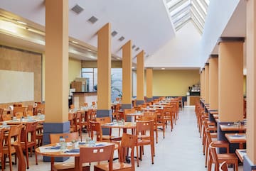 a room with tables and chairs