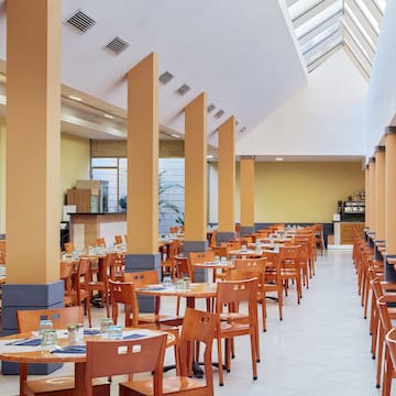 a room with tables and chairs
