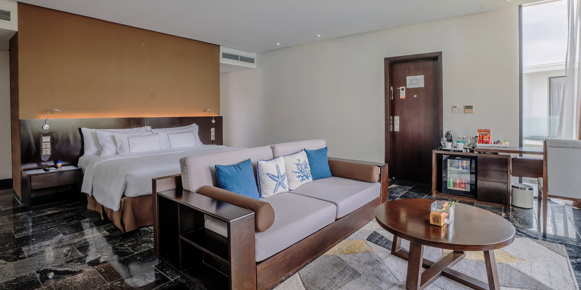 a room with a bed and a couch