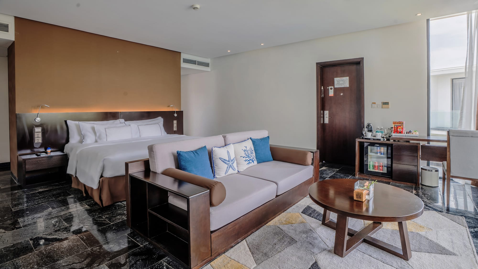 a room with a bed and a couch