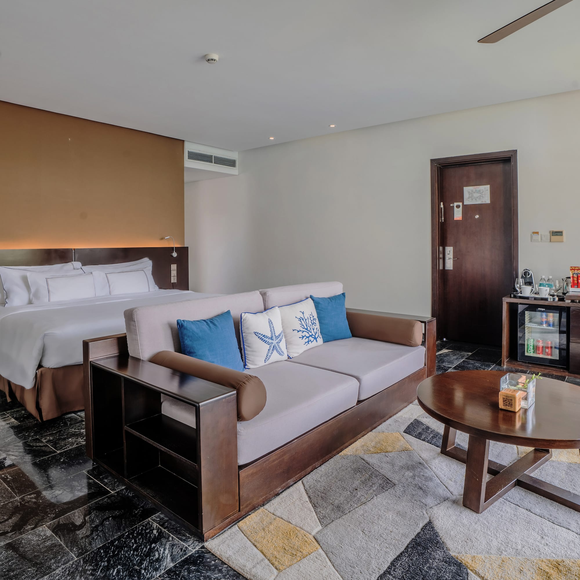 a room with a bed and a couch