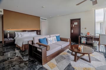 a room with a bed and a couch