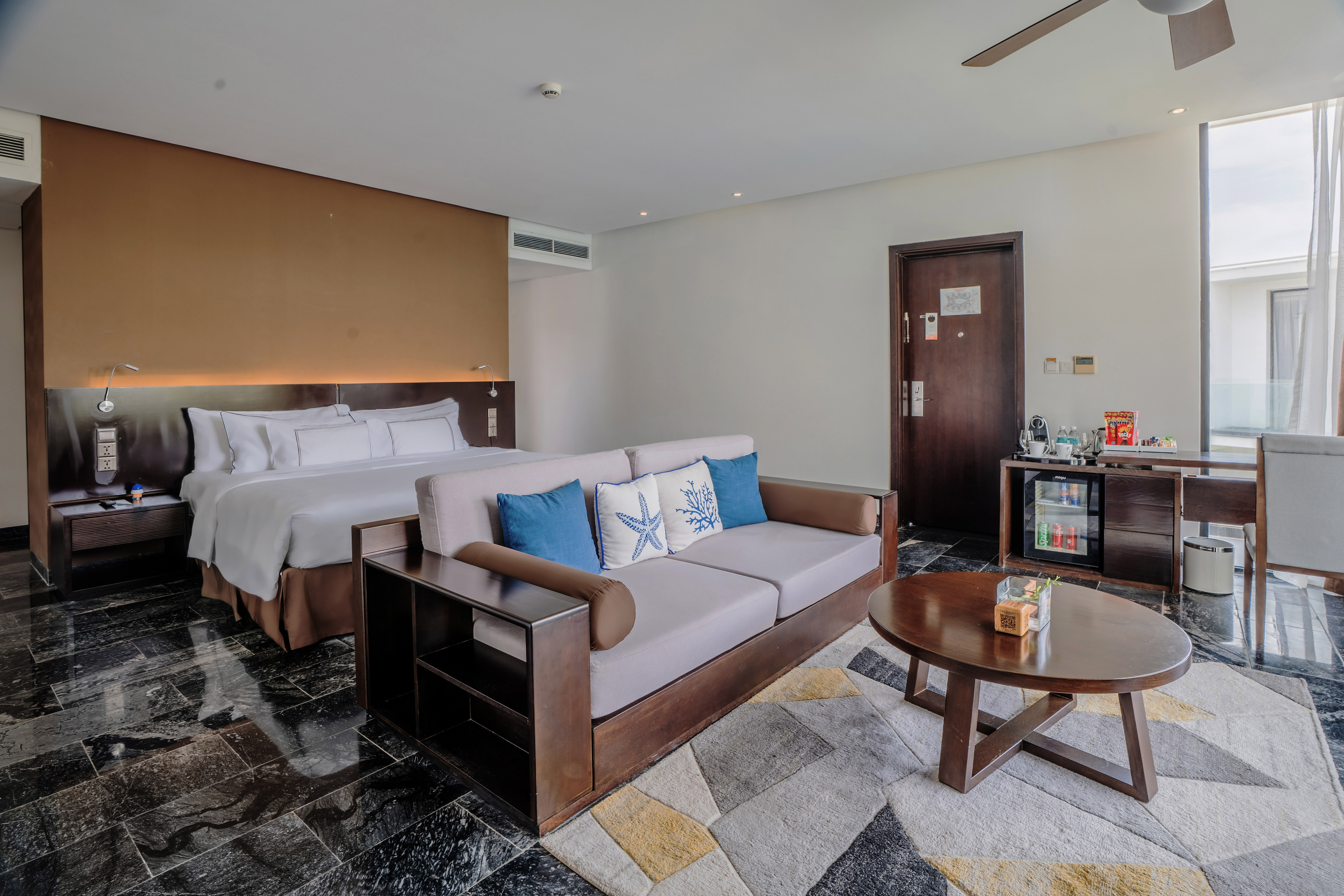 a room with a bed and a couch