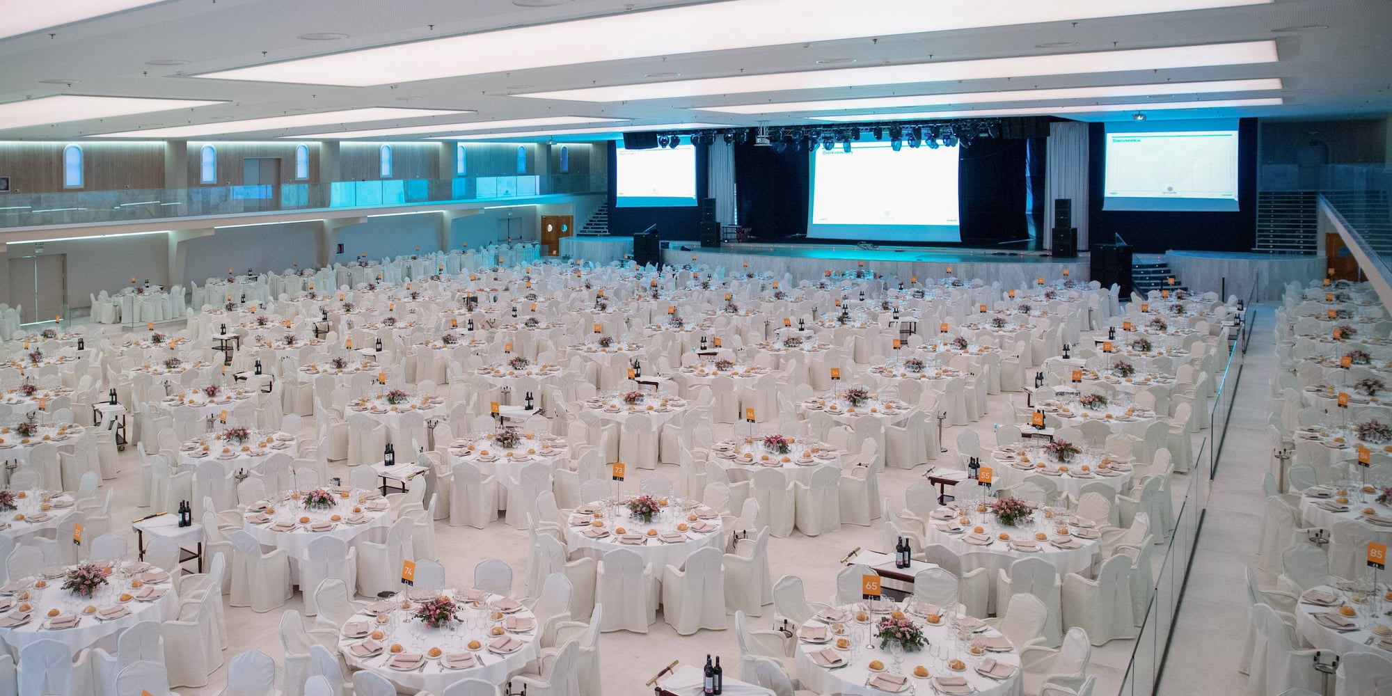 a large room with tables and chairs