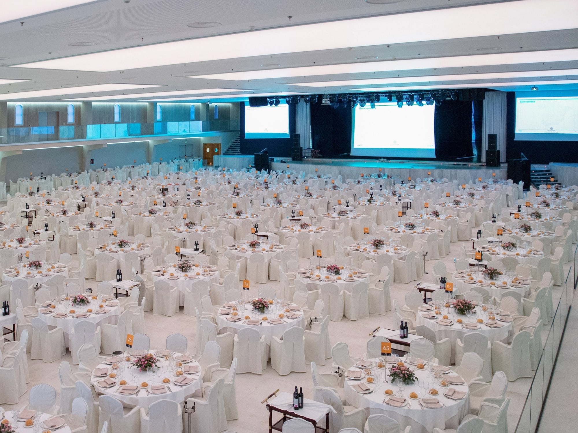 a large room with tables and chairs