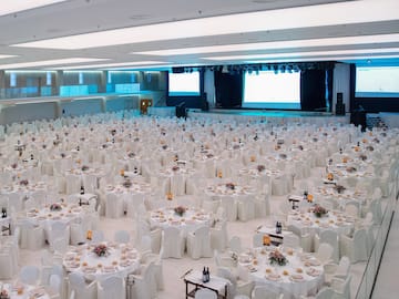 a large room with tables and chairs
