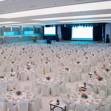 a large room with tables and chairs