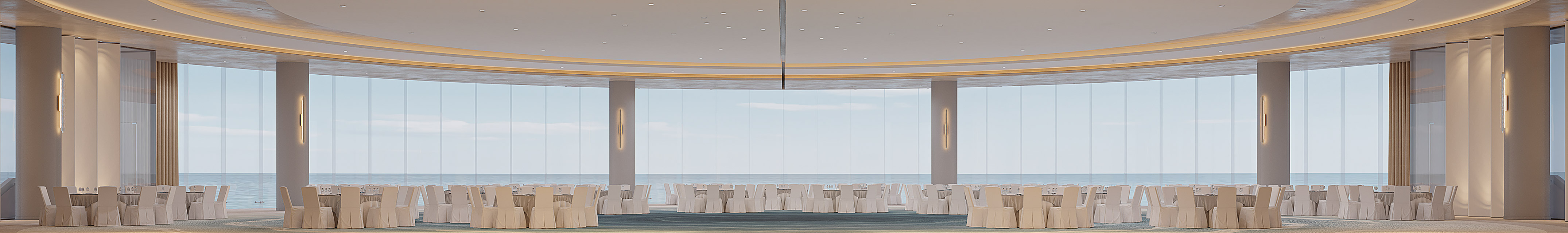 Elegant oceanfront ballroom with banquet tables and panoramic sea views.