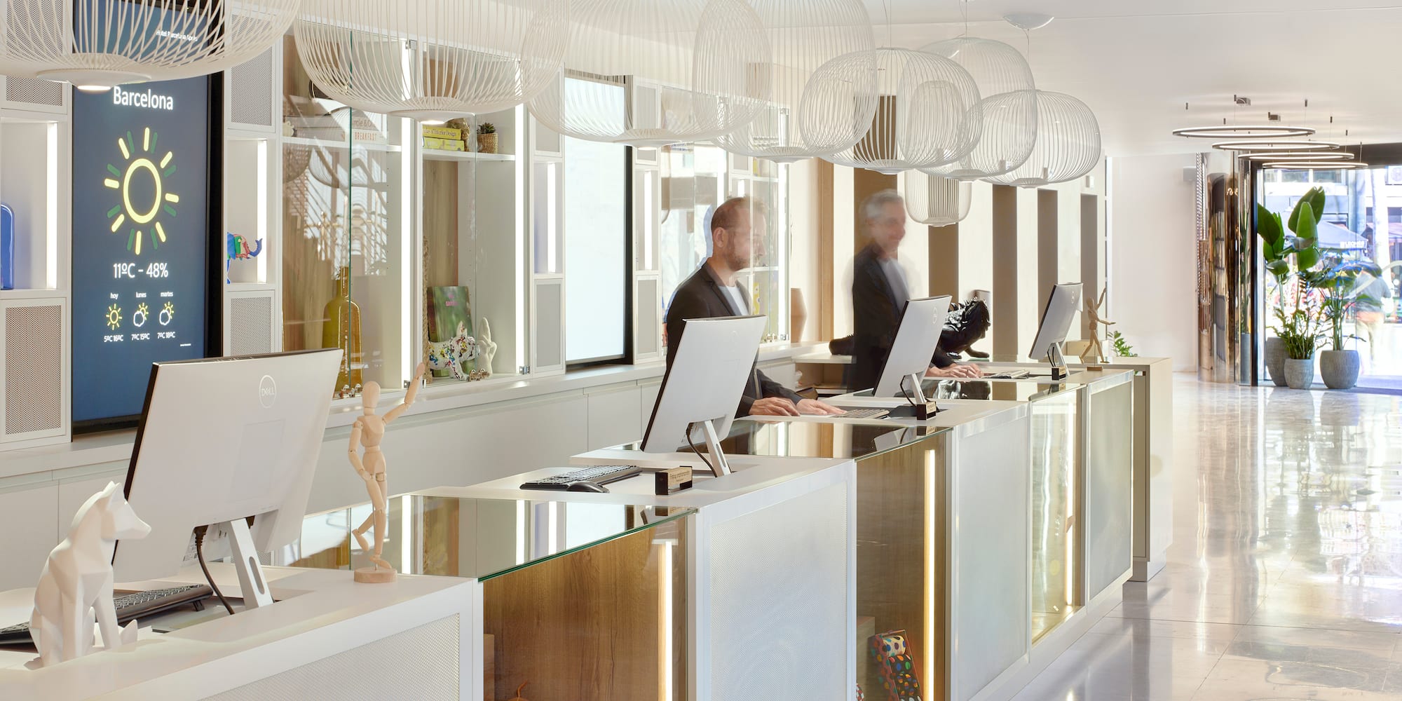 a group of people working at a desk
