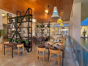 a room with tables and chairs