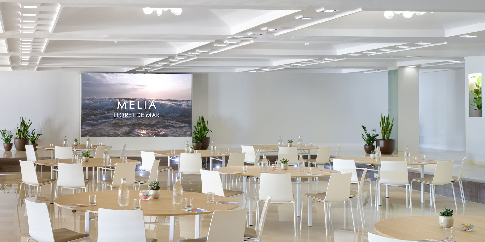 a room with tables and chairs