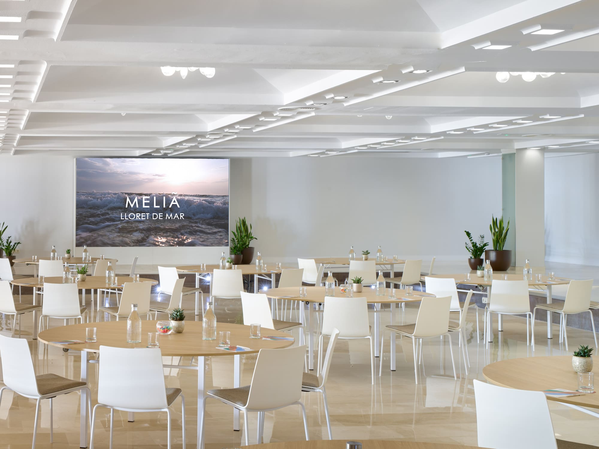 a room with tables and chairs