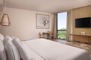 a room with a bed and a table