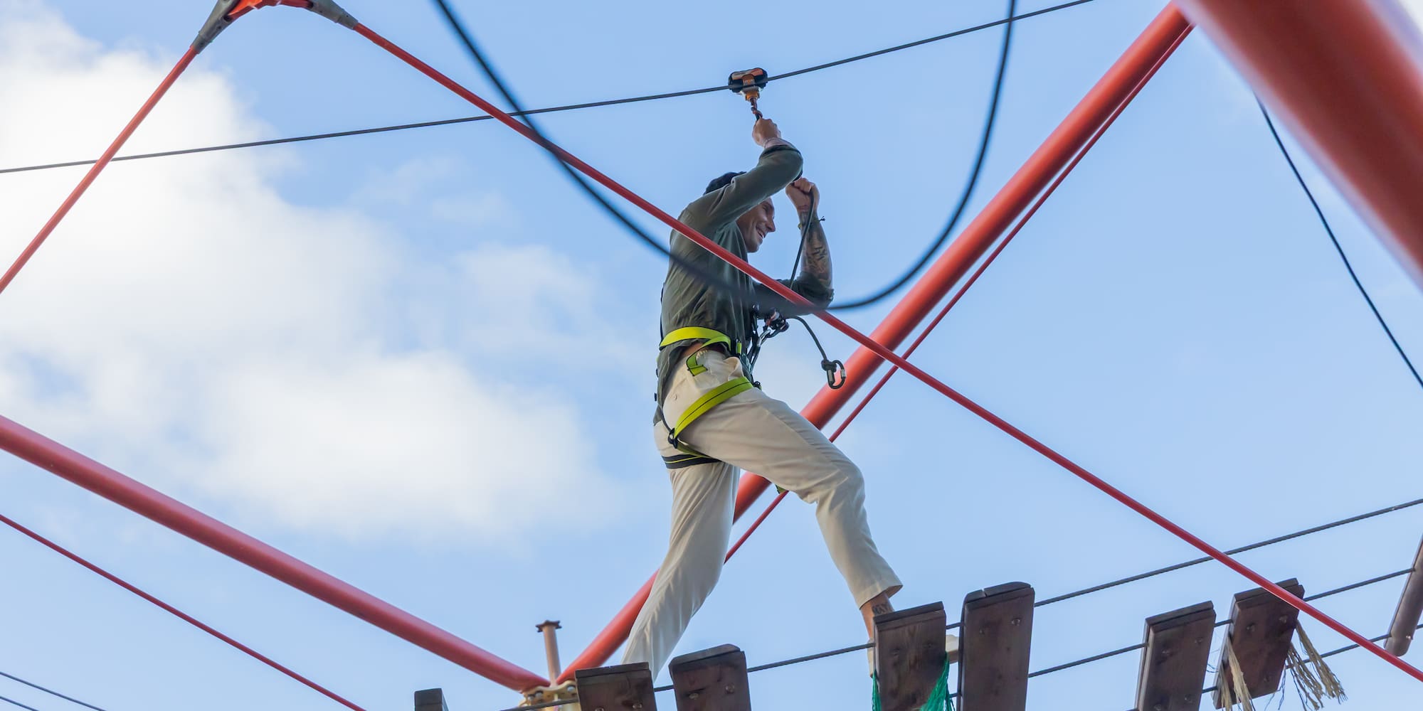 a person on a rope bridge