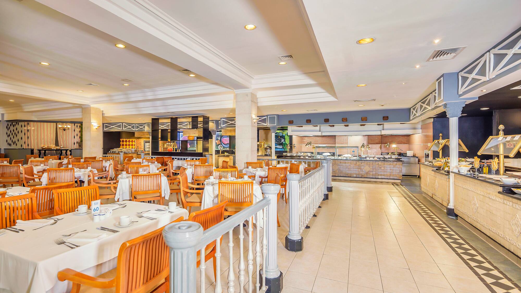 a restaurant with tables and chairs