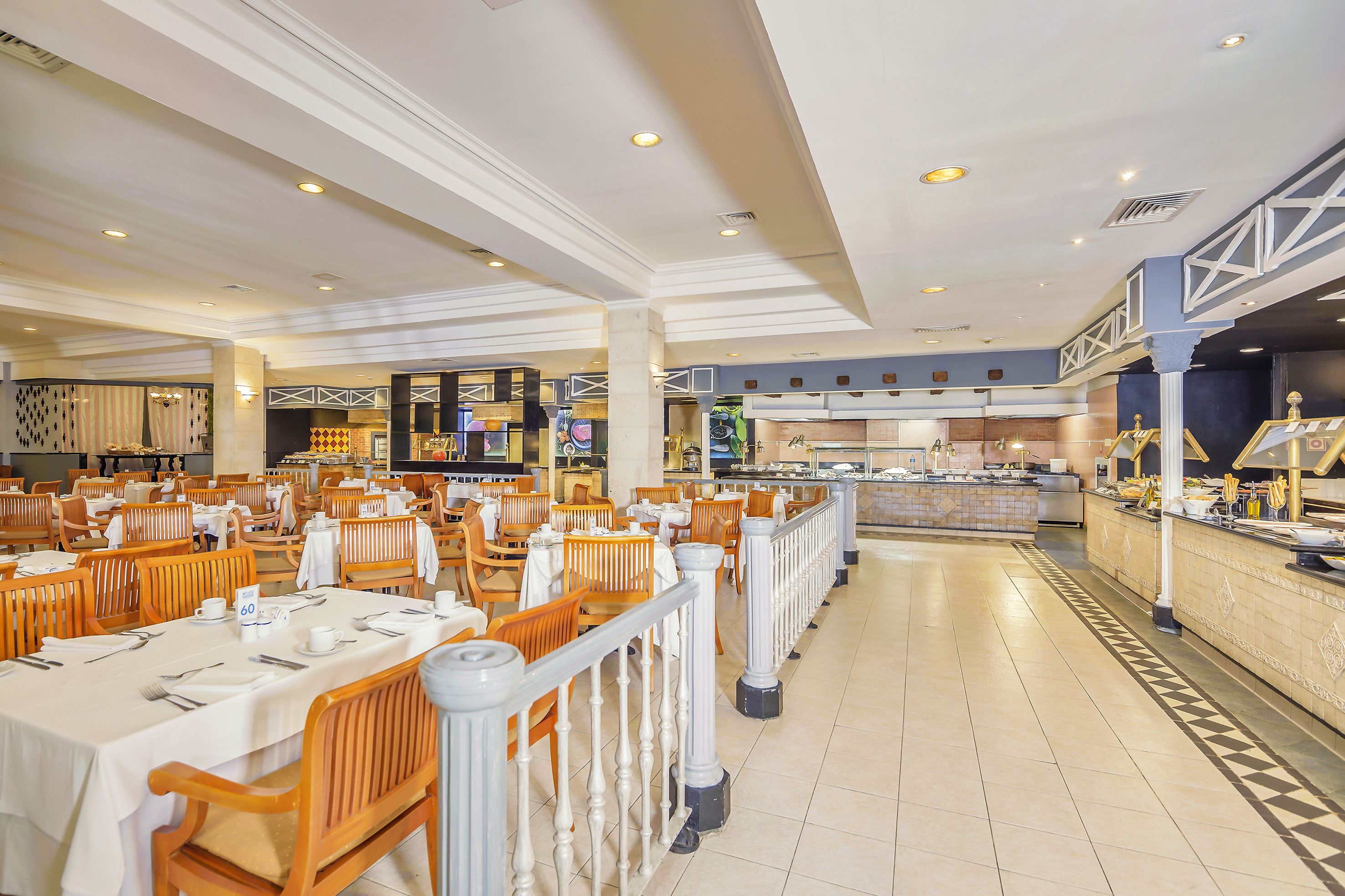 a restaurant with tables and chairs