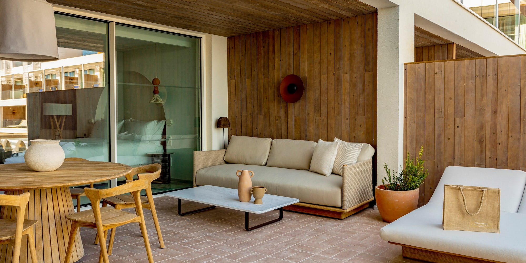 a patio with furniture and a table