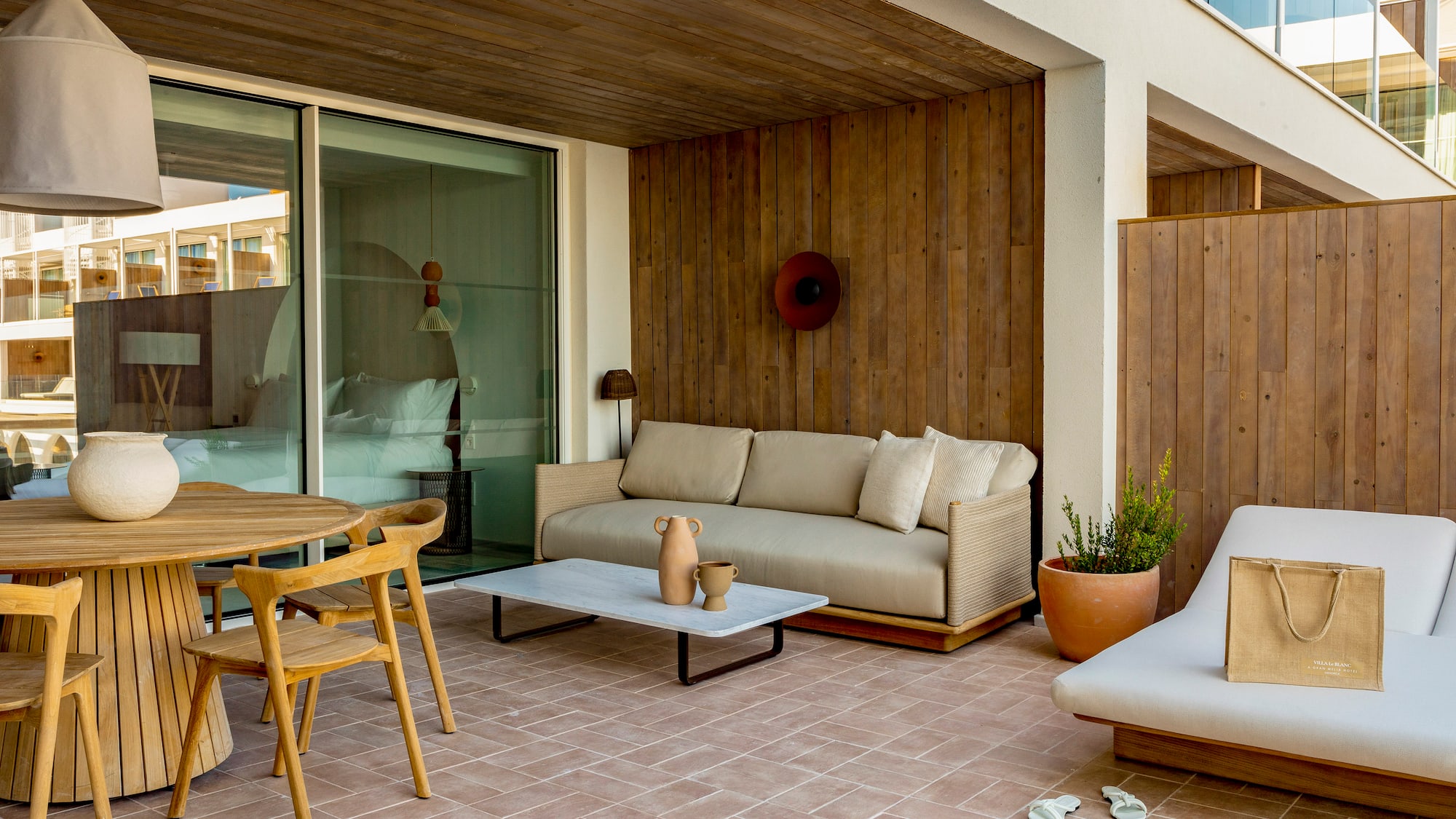 a patio with furniture and a table