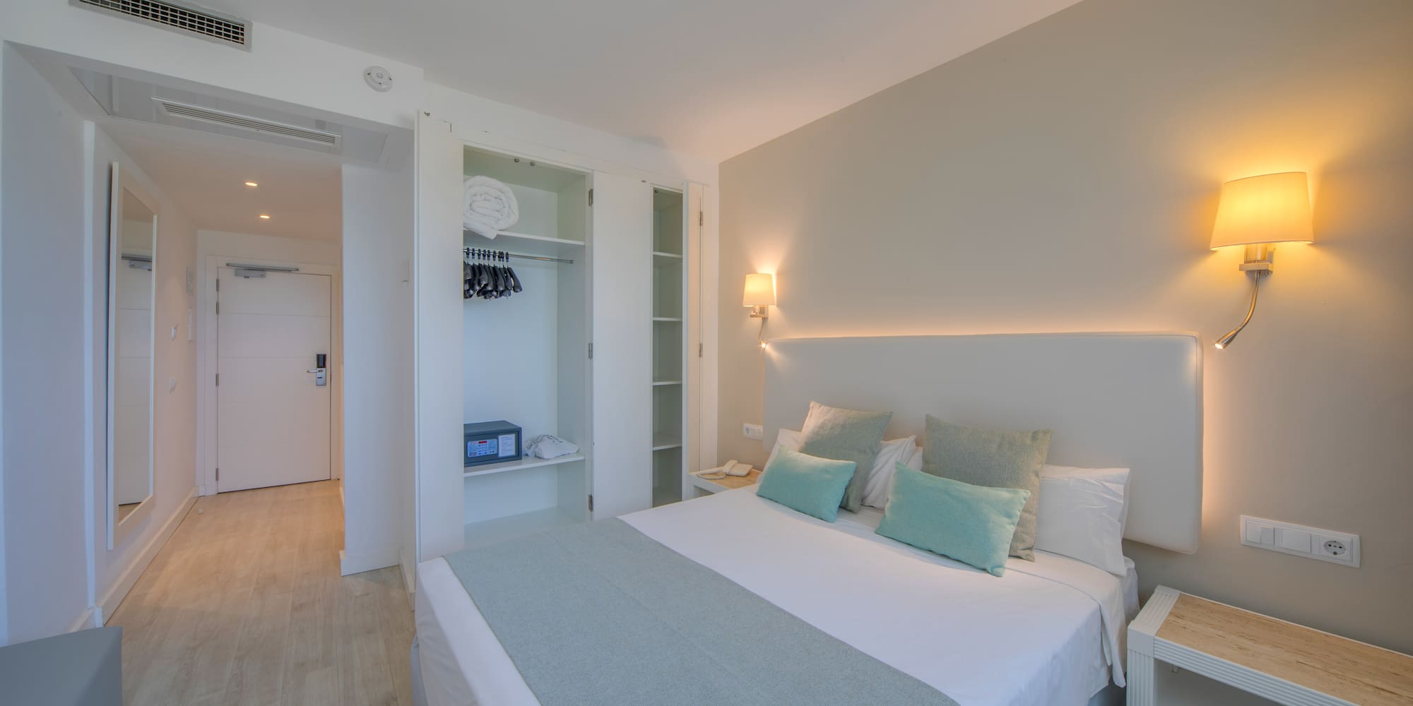 a bedroom with a bed and a closet