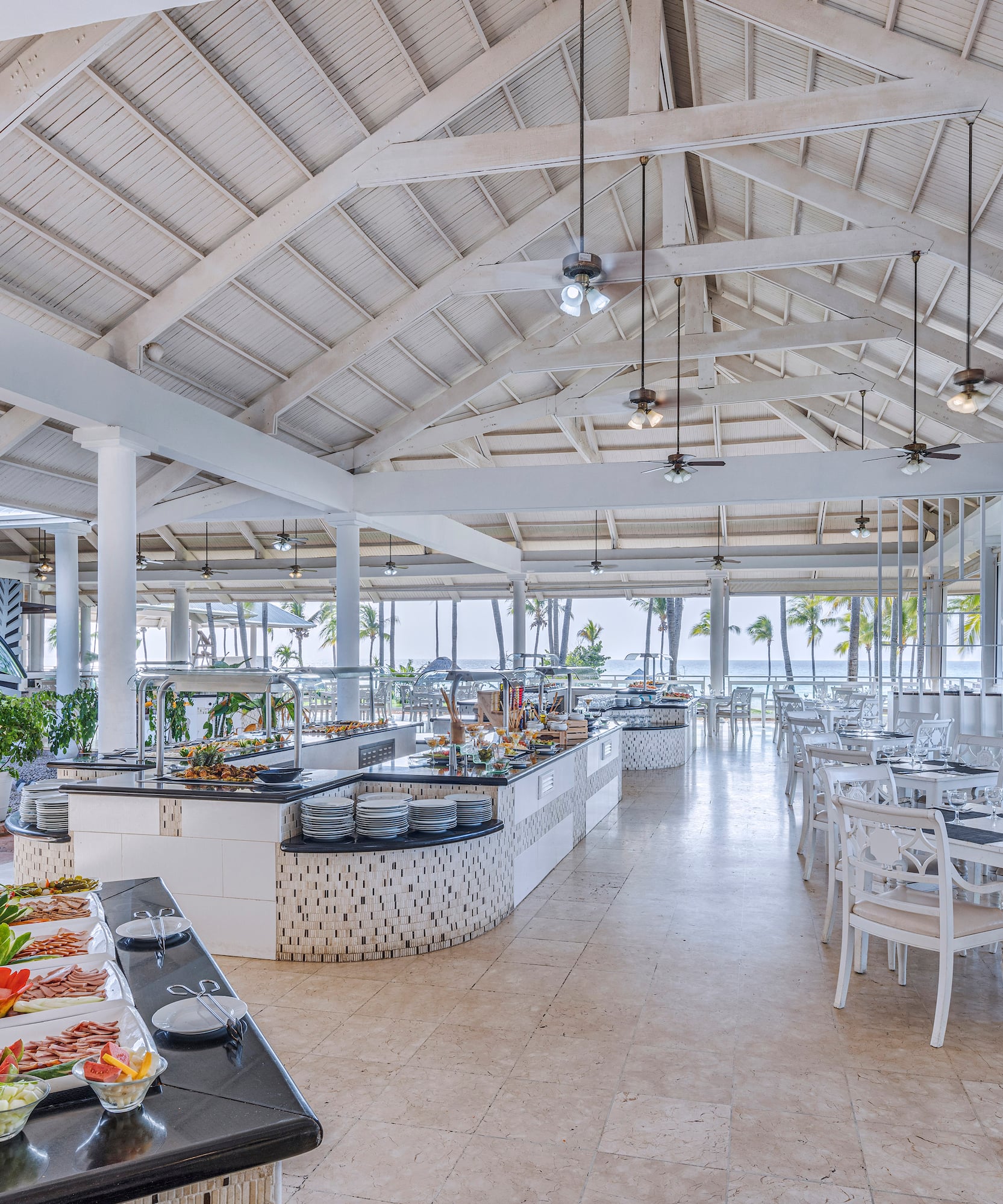 a restaurant with tables and chairs