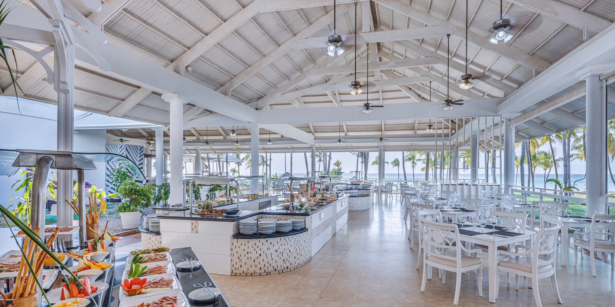 a restaurant with tables and chairs