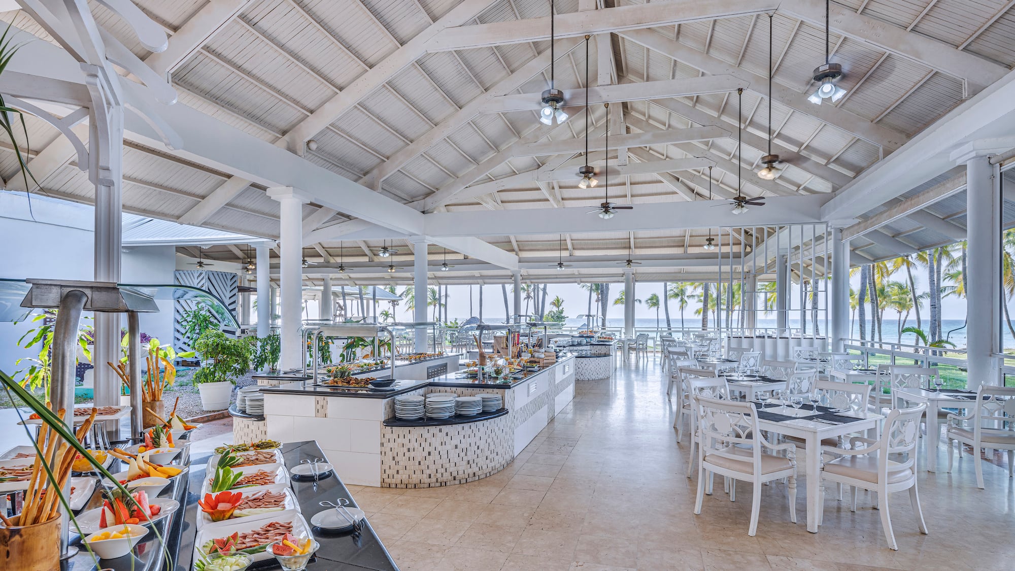 a restaurant with tables and chairs