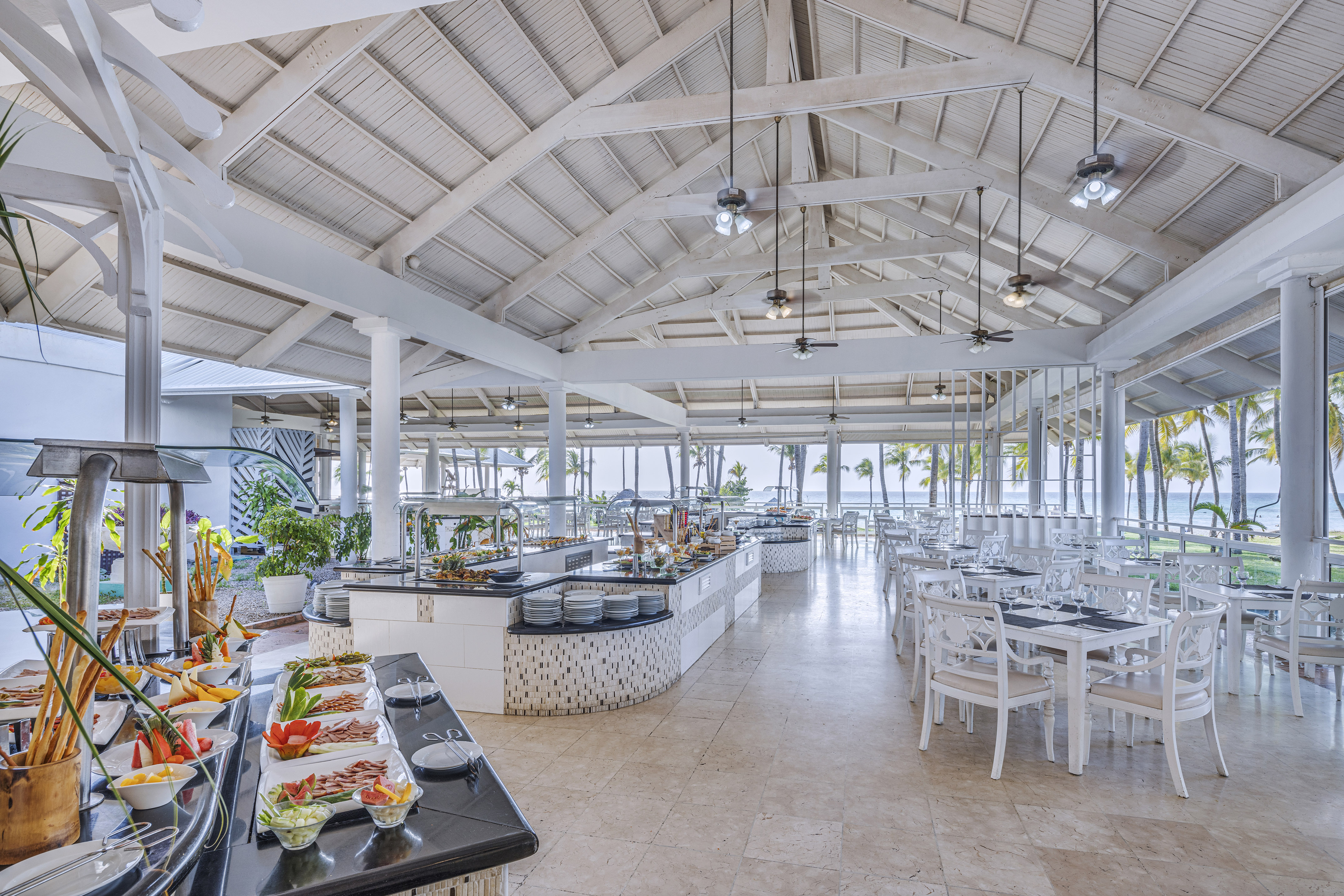 a restaurant with tables and chairs