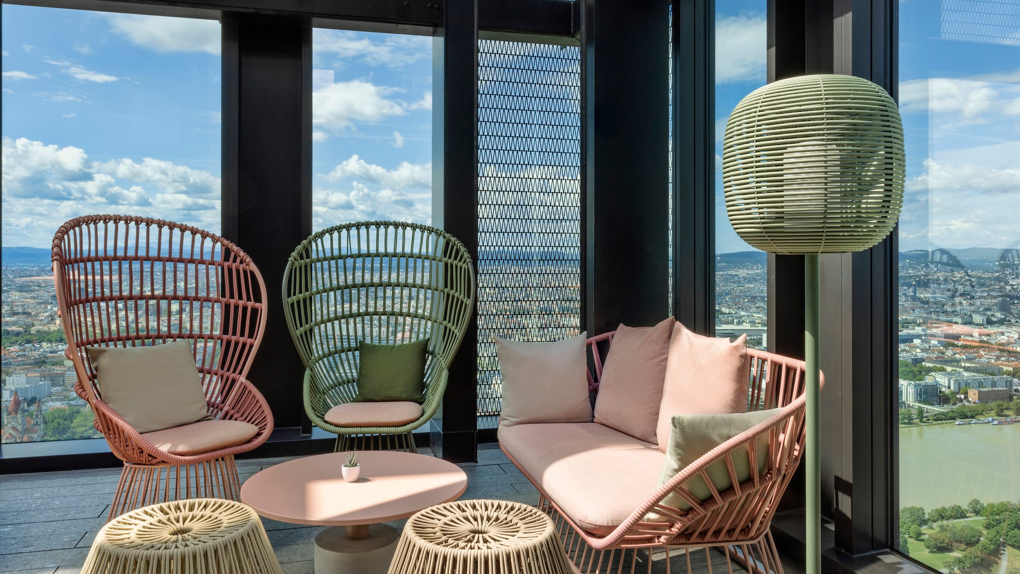a room with wicker furniture and a table