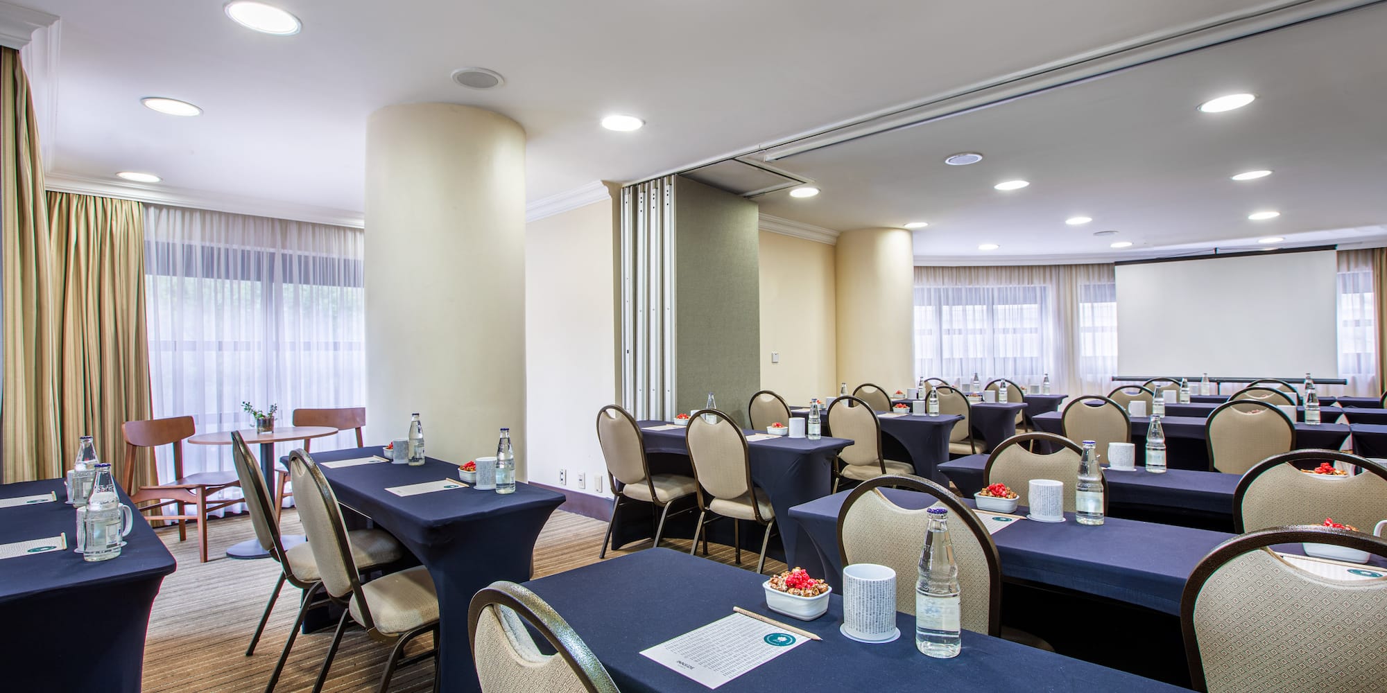 a room with tables and chairs