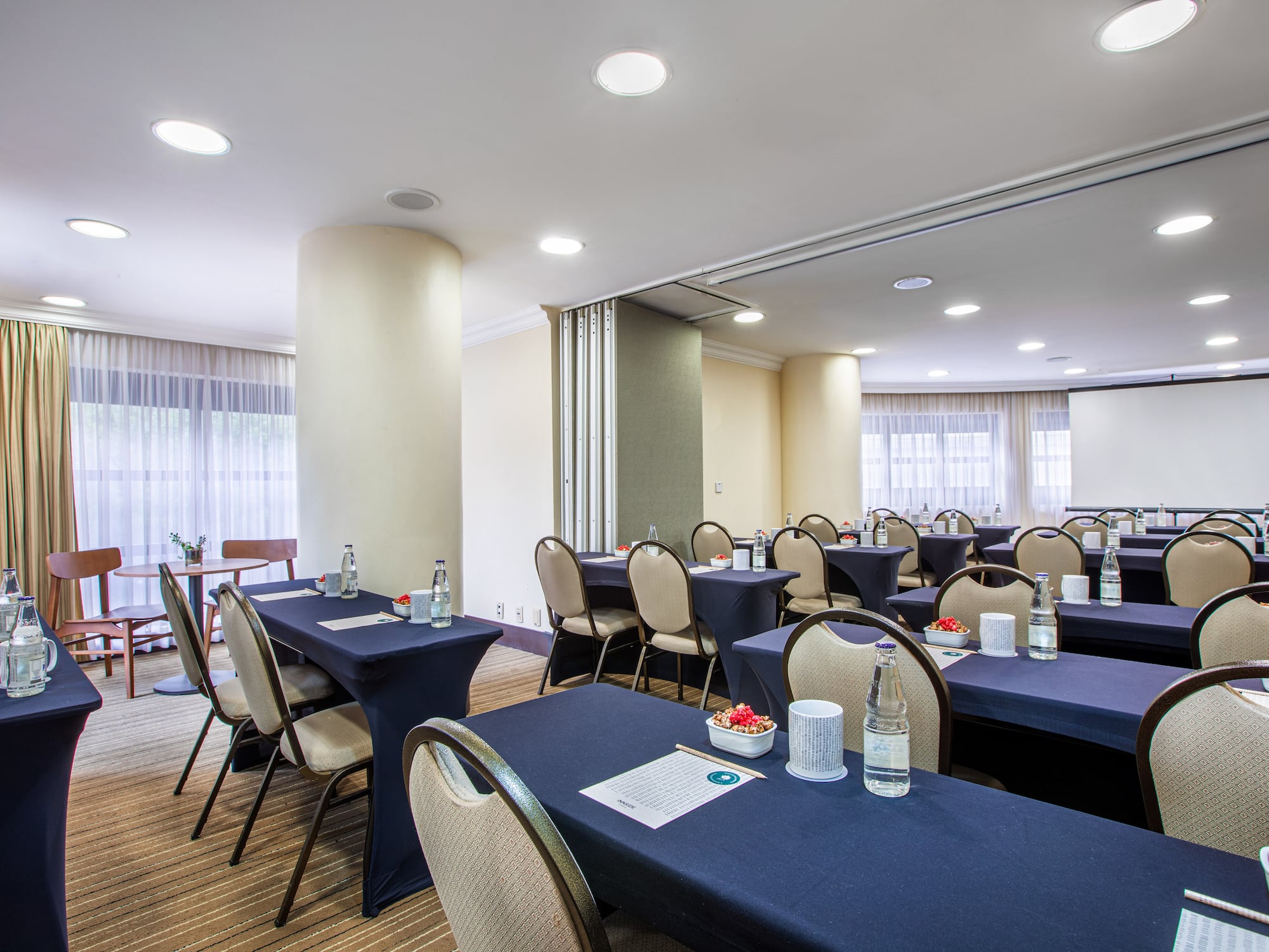 a room with tables and chairs