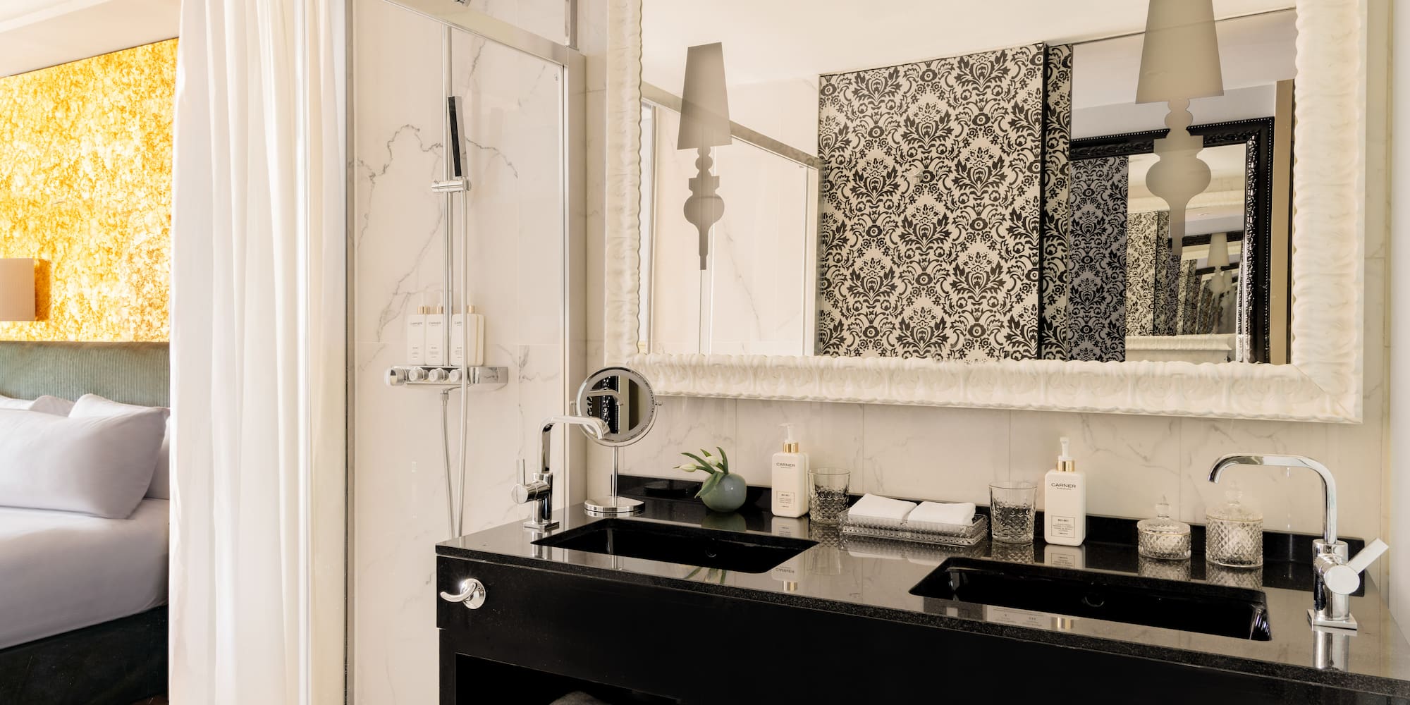 a bathroom with a mirror and a black counter