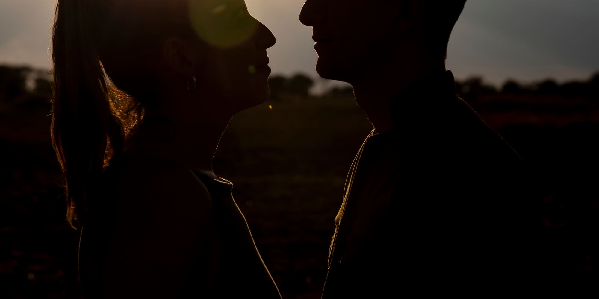 a silhouette of a man and woman