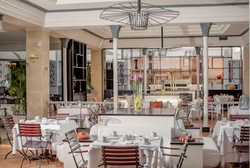 a room with tables and chairs