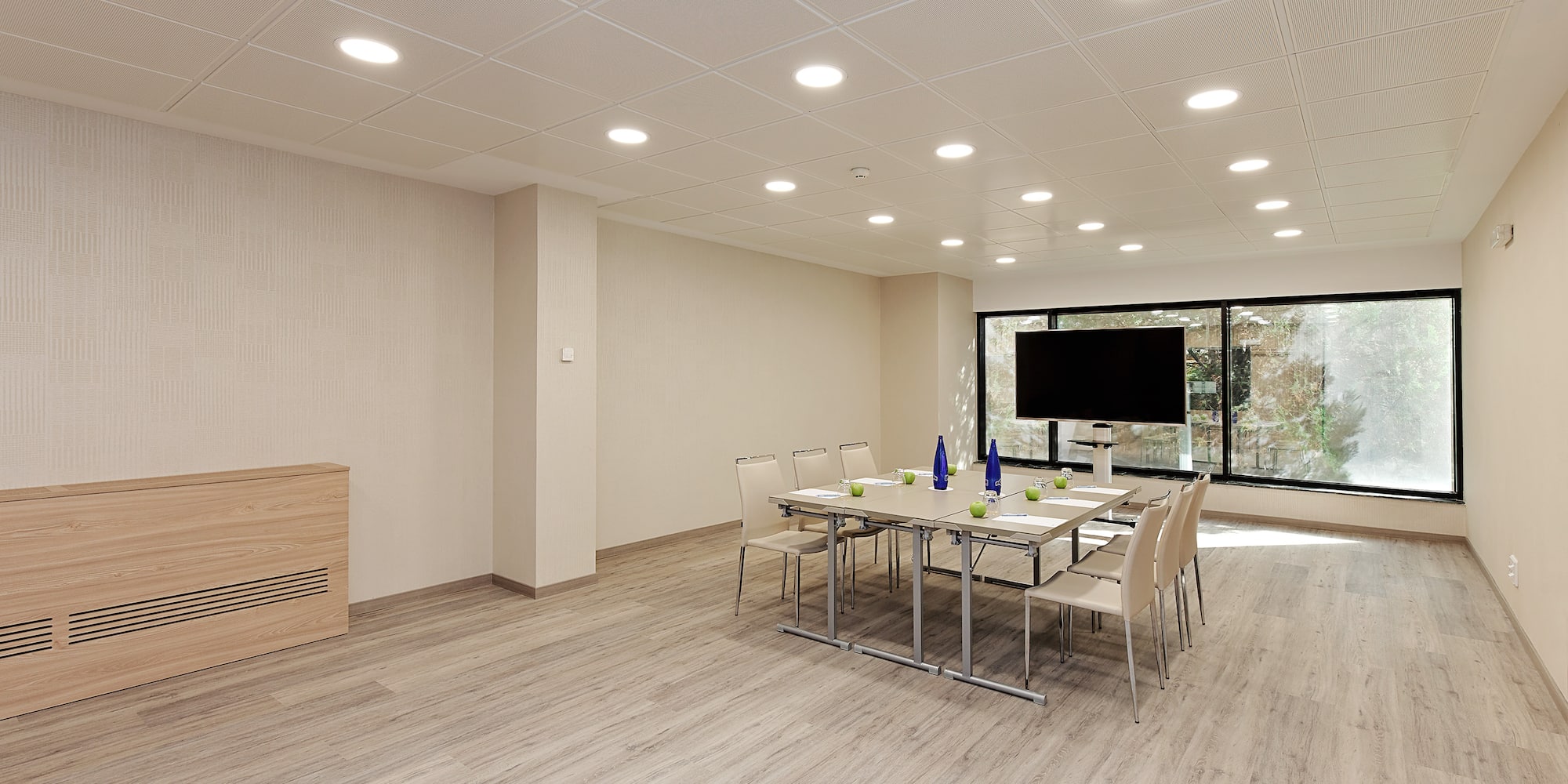 a room with a table and chairs