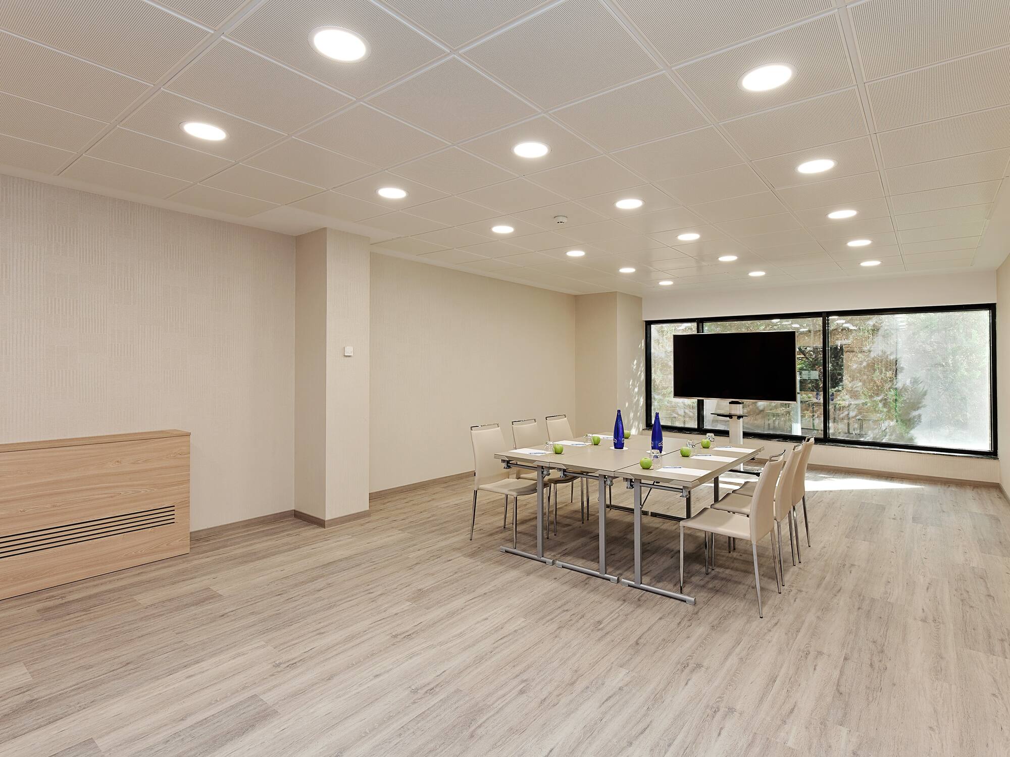 a room with a table and chairs